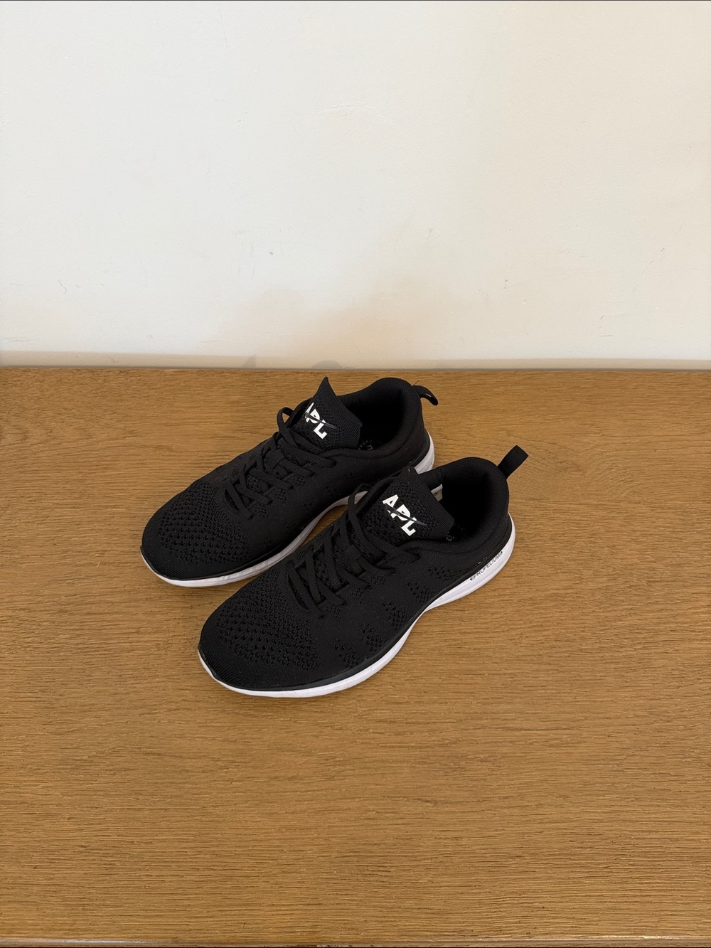 APL women’s Black Knit Athletic Sneakers with White Midsole
